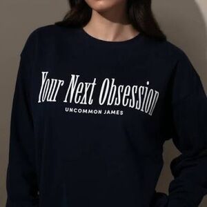 Uncommon James Dark Blue Sweatshirt with White Text